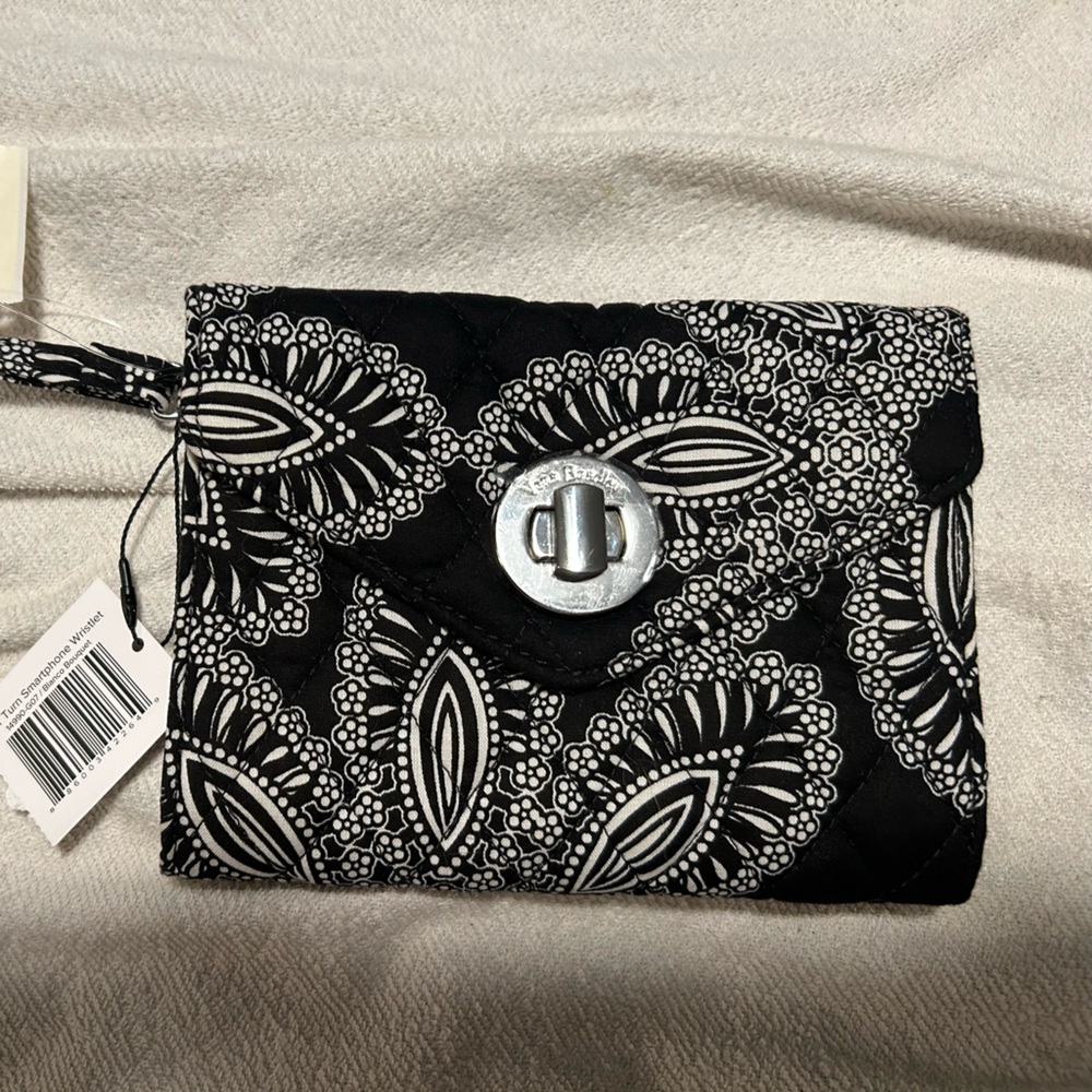 Black Vera Bradley wristlet. Brand new with tags. Very nice item